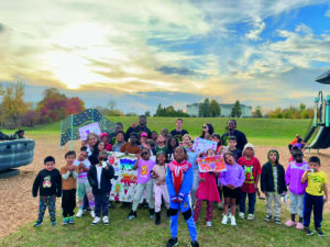 picture of children at on playground at elementary school having fun
