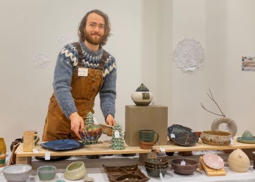picture of an artists at the pottery sale