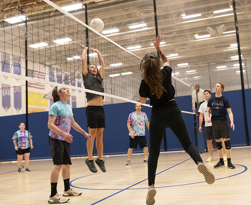 image of women playing volleyball