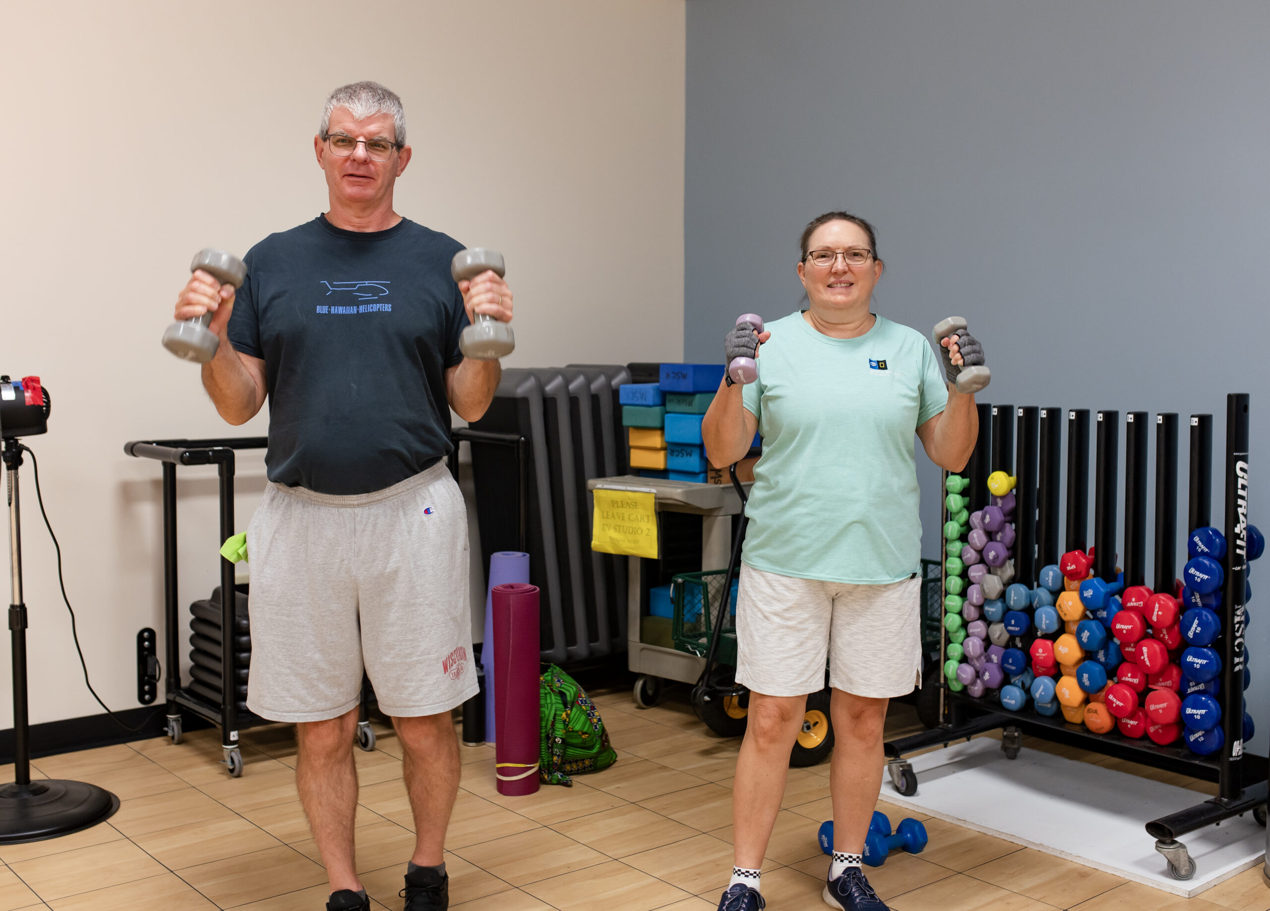 Picture of two people exercising.