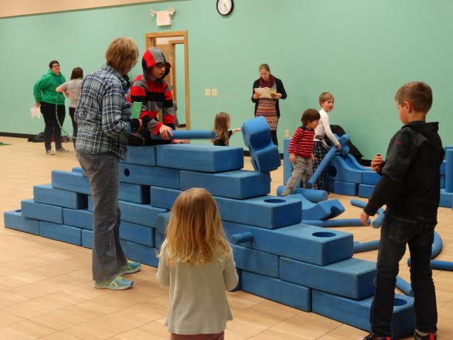 picture of children playing on a structure