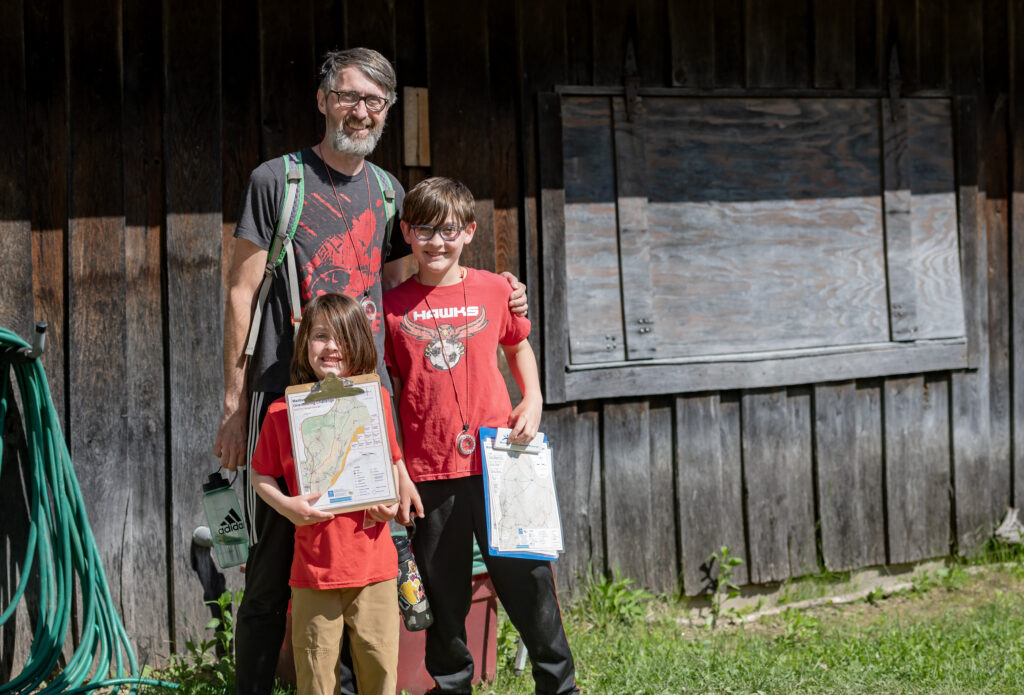 picture of family posed at the Madison School Forest